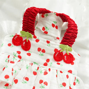 Cherry Dog Dress has red straps and cherry pattern on white
