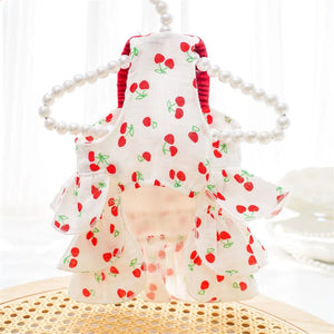 Cherry Dog Dress is mae of spandex polyester and slides on overhead.