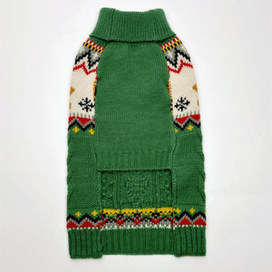 Green dog sweater with colorful pattern on a white background