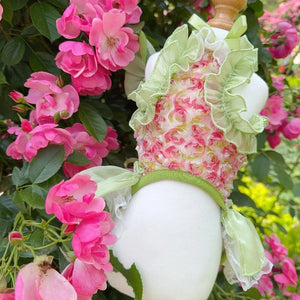 Pink-Green Rose Garden Dog Party is a pullover design and has ruffled mint green sleeves.
