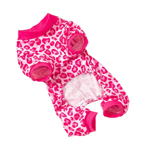 Pink leopard print dog onesie on a white background