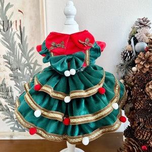 A beautiful designer dress for your dog for the holidays, with cascading layers of fabric to look like a Christmas tree.