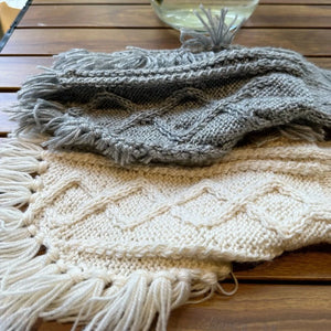 Handmade Hooded Cable Knit Sweater Dog Poncho has knotted tassles at the ends