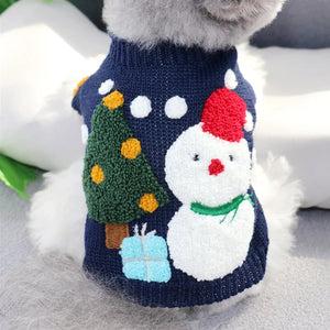 Snowman Dog Sweater fits small and medium dogs like this Toy Poodle