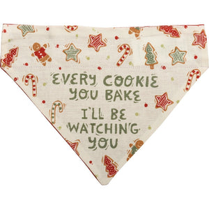 This reversible off-white Christmas dog collar bandana features "Every Cookie You Bake I'll Be Watching You" sentiment and Christmas cookie designs on this side.