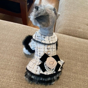 Exquisitely crafted with the finest details, this Handmade Tweed Dog Dress Coat is adorned with black fur sleeves, ornate beading, lace and buttons, rose waistline and tulle skirt.