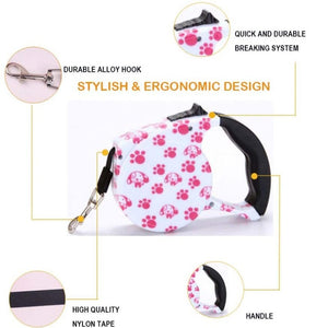 Pink Paws 3M/5M Retractable Dog Leash is designed with an ergonomic handle.