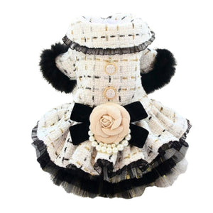 Exquisitely crafted with the finest details, this Handmade Tweed Dog Dress is adorned with black faux fur sleeves, ornate beading, lace and buttons, rose waistline and tulle skirt.