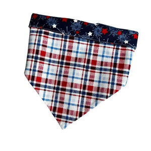Handmade in the USA by Chloe & Max, this Plaid & Stars Bandana features red, white and blue plaid, with star trim and backing.