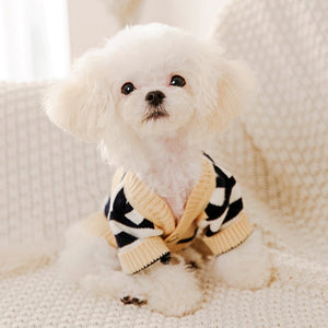 This classy Striped Button-Down Dog Cardigan fits small to medium dogs.