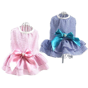 Available in pink or blue, this Sweet Stripes Dog Dress is simply sweeter than sweet.