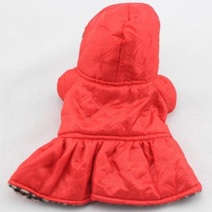 This Reversible Hooded Dog Coat is red on one side and leopard on the other.