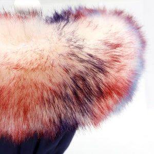 This chic dog jacket is hooded with faux fur.