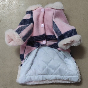 Our Classy Pink Dog Harness Dress Coat features a quilt lining for comfort.