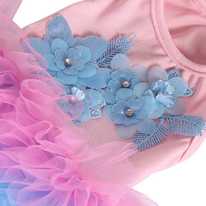 Pretty floral applique adorns the bodice of this dog dress. 