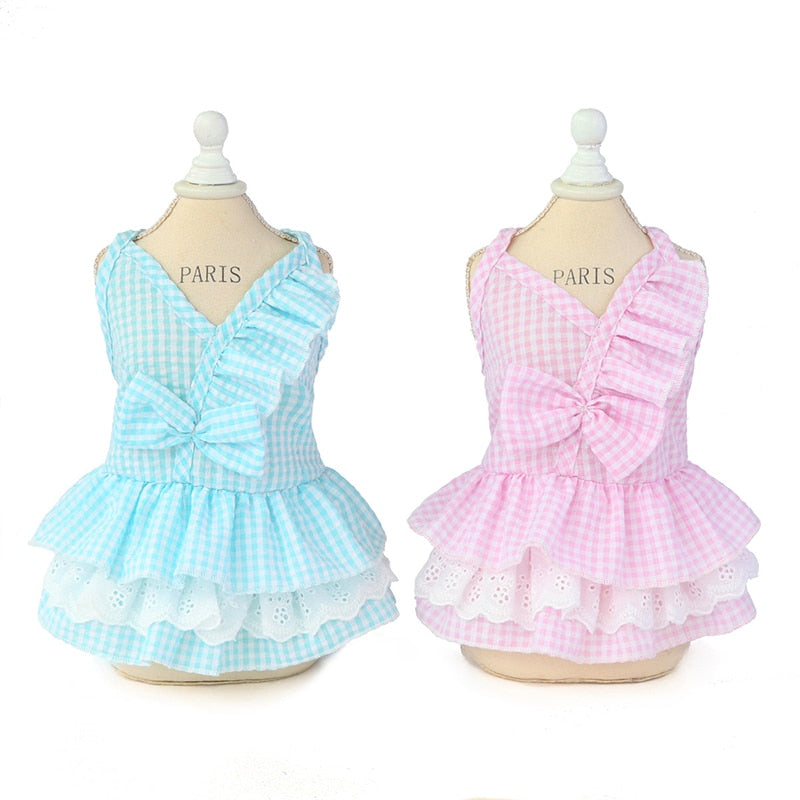 Show off your pup's sweet side with this darling Gingham Plaid Summer Dog Dress, available in pink or blue.