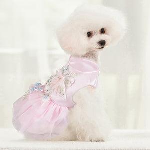 Your doggy will look elegant in this gorgeous Floral Cascade Dog Dress, available in 2 colors: blue or pink. 