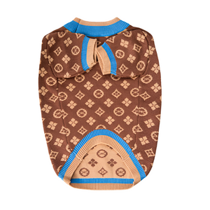 Pomeranian wearing Brown LV-Inspired Dog Sweater has a pullover design