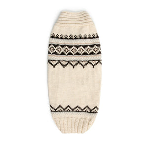 A cream-colored knit pet sweater with black geometric patterns and ribbed cuffs, laid flat on a white background.