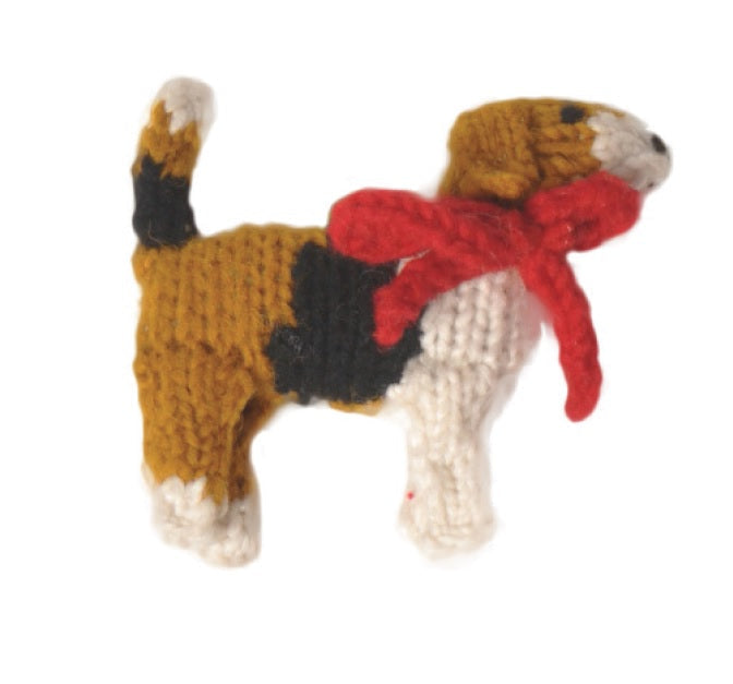 Knitted Beagle Ornament with a red scarf on a white background
