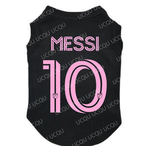 Black pet shirt with pink 'Messi 10' text on a white background