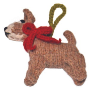 Knitted Chihuahua ornament with a red bow on a white background