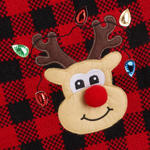 Reindeer face and Christmas lights on a red and black checkered dog sweater