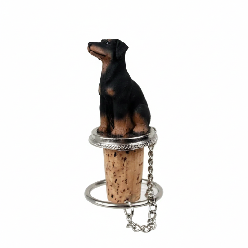 Dog-shaped bottle stopper with cork on a white background