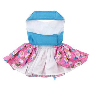 Dress has adjustable Velcro straps at the neck and waistline