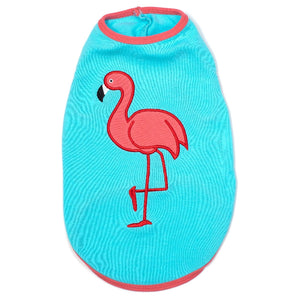 Blue pet shirt with a pink flamingo design on a white background