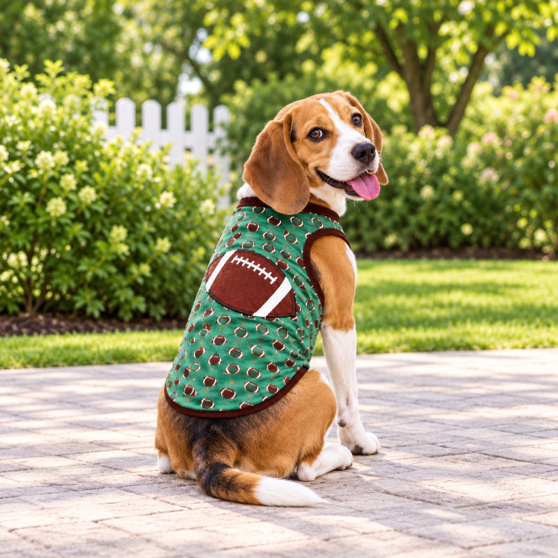 Dog shirt with football pattern on a green background