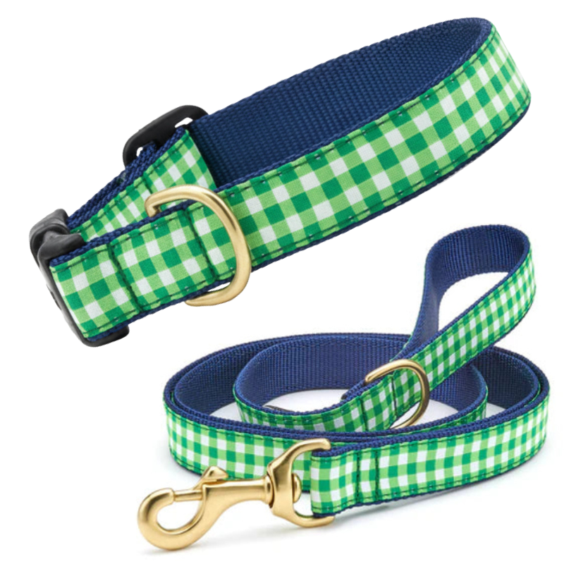 Green and white checkered dog collar and leash set on a white background