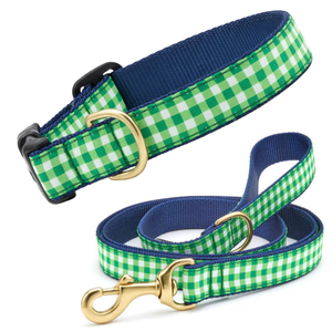 Green and white checkered dog collar and leash set on a white background