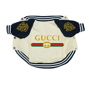 Cream and navy dog jacket with Gucci logo on a white background