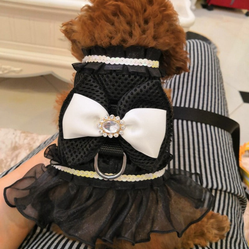 Princess Lace Dress Dog Harness & Leash Set is adorned with a large satin bow and D-ring, sequins, and tulle skirt.