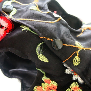 Our handmade black Carmen Dog Party Dress features 3 snap buttons on underbelly for easy on/off.