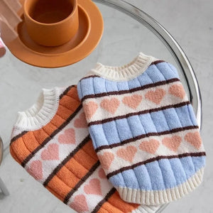 Winter Love Dog Sweaters come in orange or blue stripes