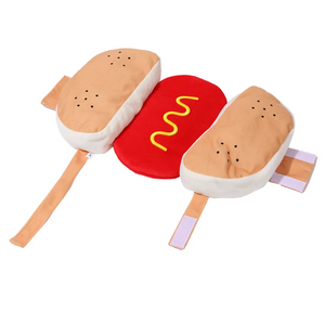 Plush dog costume resembling a hot dog on a bun with a red base and yellow mustard, on a white background.