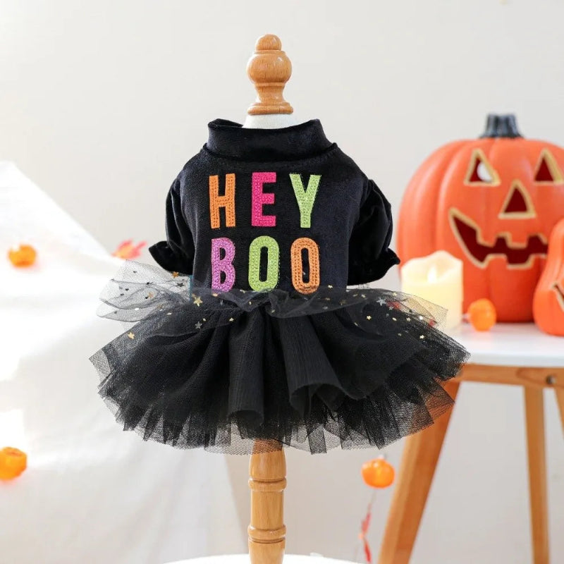 Black Halloween-themed outfit with 'HEY BOO' text on a wooden mannequin against a white background.