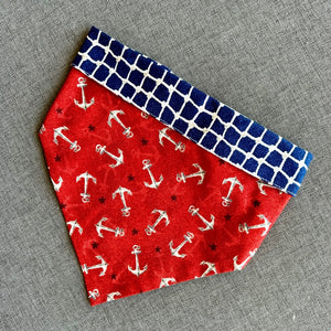 Anchor Dog Collar features anchors on red, with blue netting trim and backing
