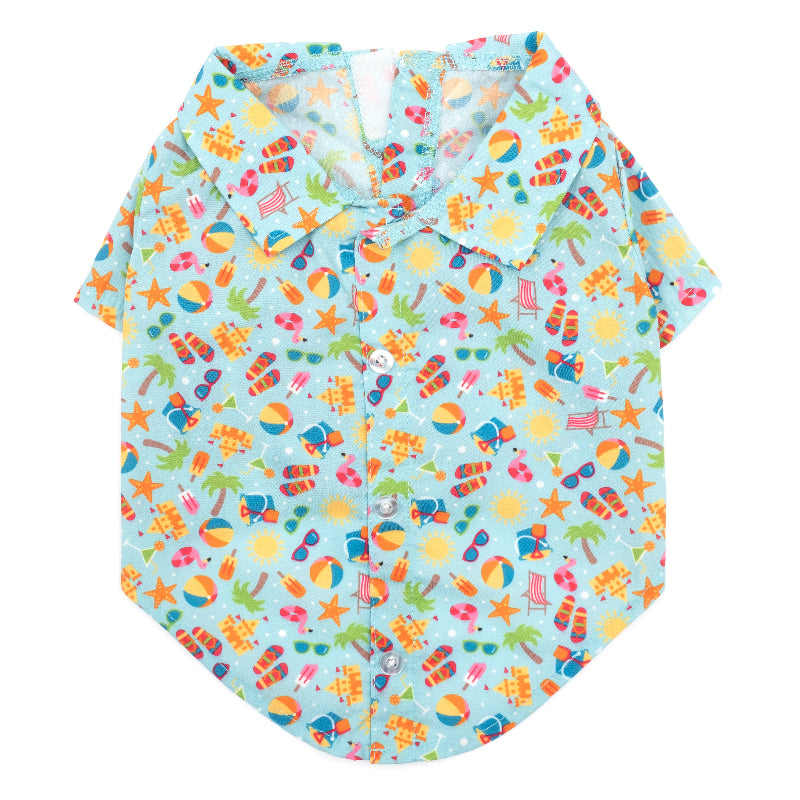 Colorful beach-themed shirt with patterns on a light blue background