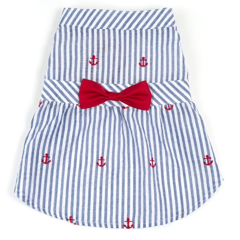 Blue and white striped dress with red anchors and a bow on a white background