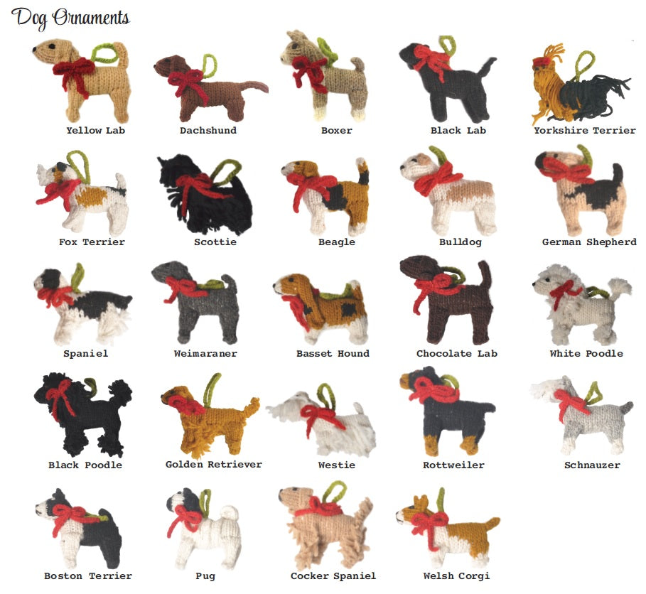 Crocheted dog ornament with a red bow tie on a white background