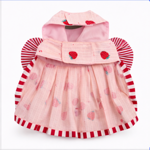 Pink strawberry dress has adjustable Velcro straps at the neck and chest