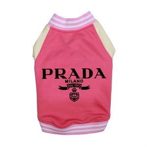 Pink Prada varsity dog jacket with white sleeves pink and white striped trim and black designer-inspired graphic