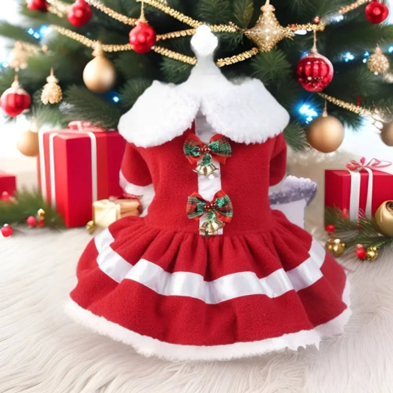 Red Christmas dress with white fur trim on a decorative background