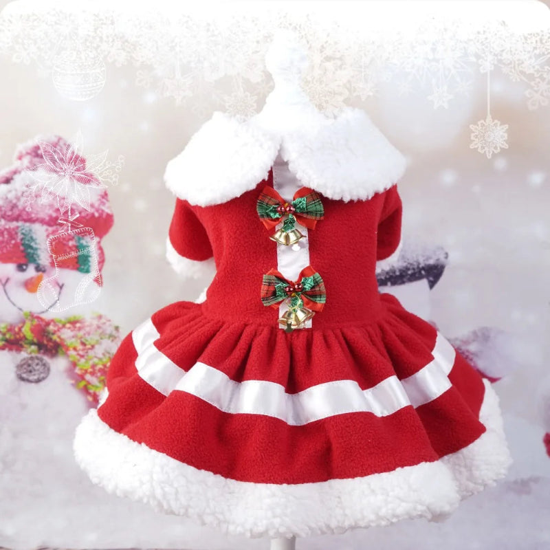 Red Christmas dress with white fur trim on a decorative background