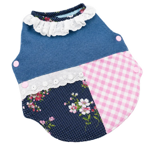 Reversible Denim Patchwork Dog Puffer blends denim, pink gingham, floral blossoms and lace into an eye-catching puffer coat that's adorable on white background