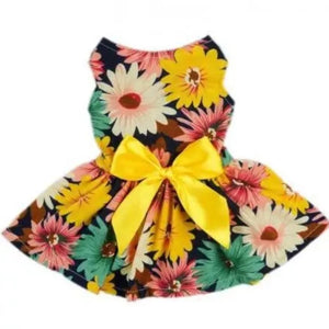 Sunflower dog party dress features a yelllow bow