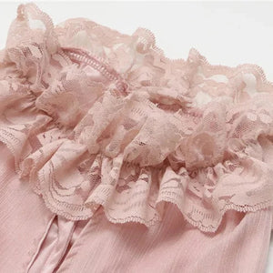 Pink dog wedding dress with lace neckline.